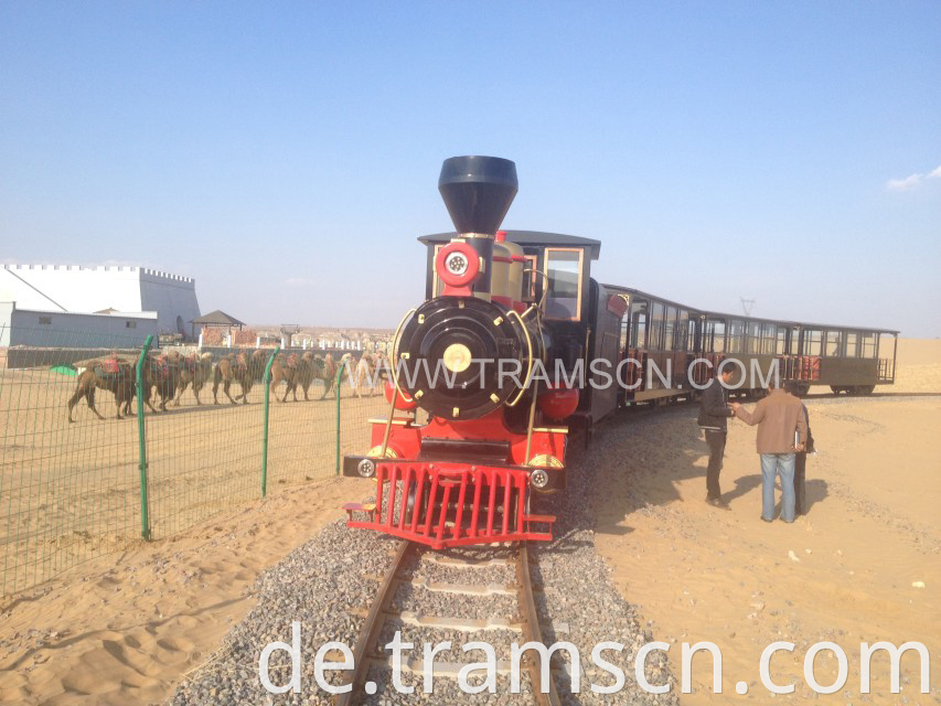 sightseeing train in desert blue sky